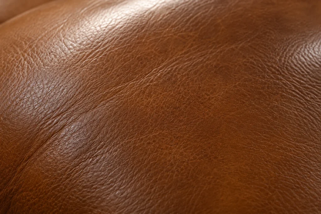 Detail of the recliner hide with one uniform color after restoration