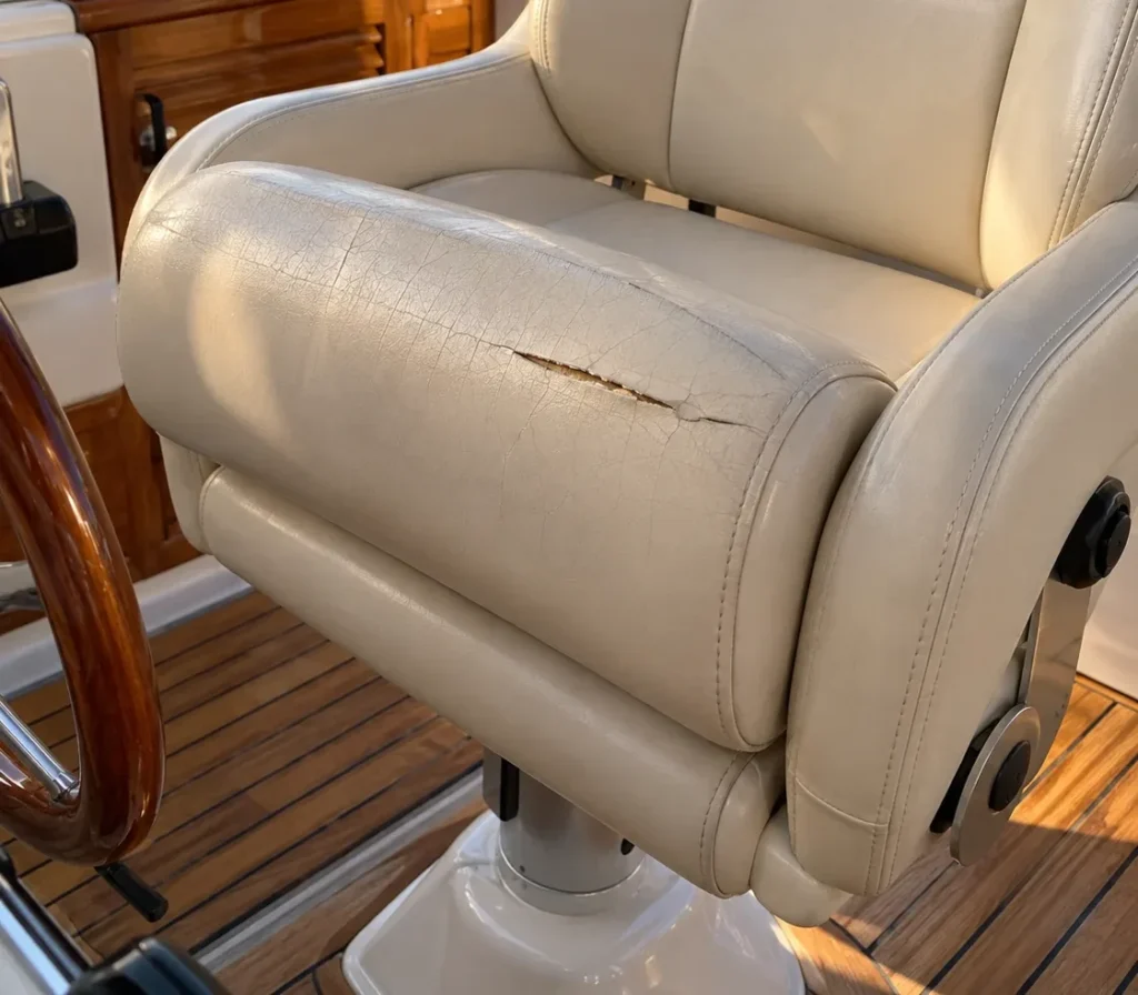 A helm seat with a split bolster