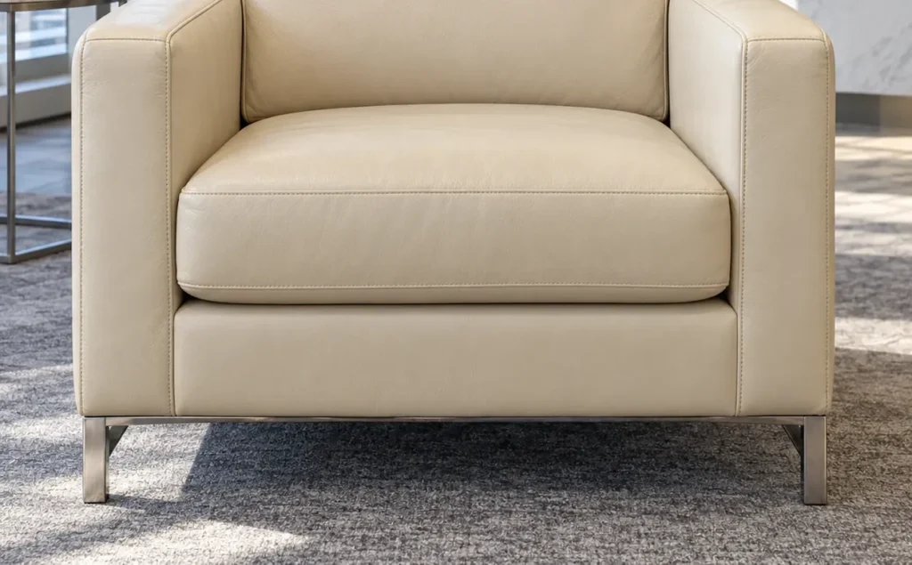 The same cream armchair once repaired