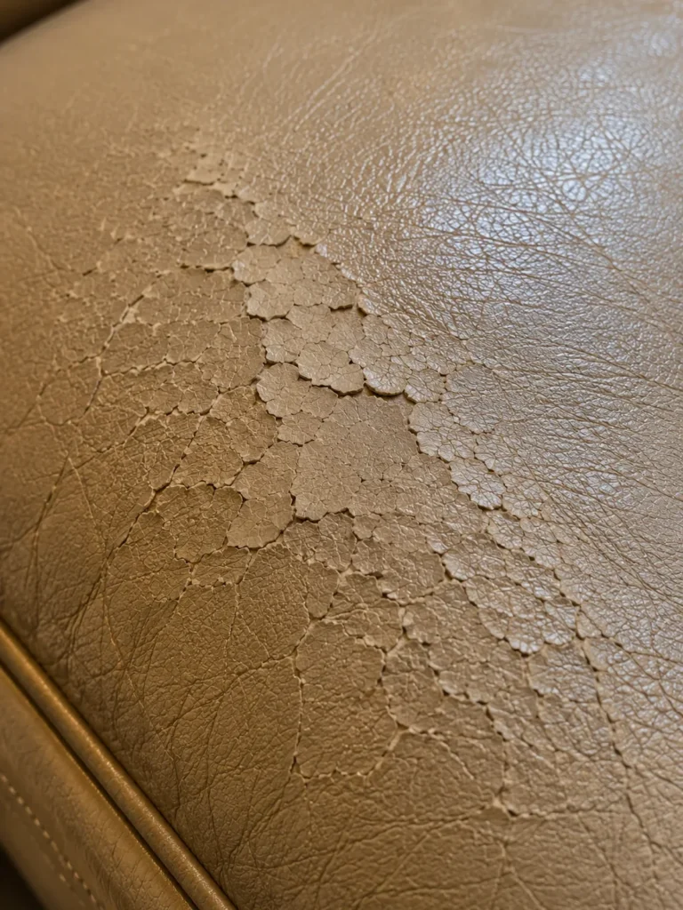 Peeling topcoat on hotel seating