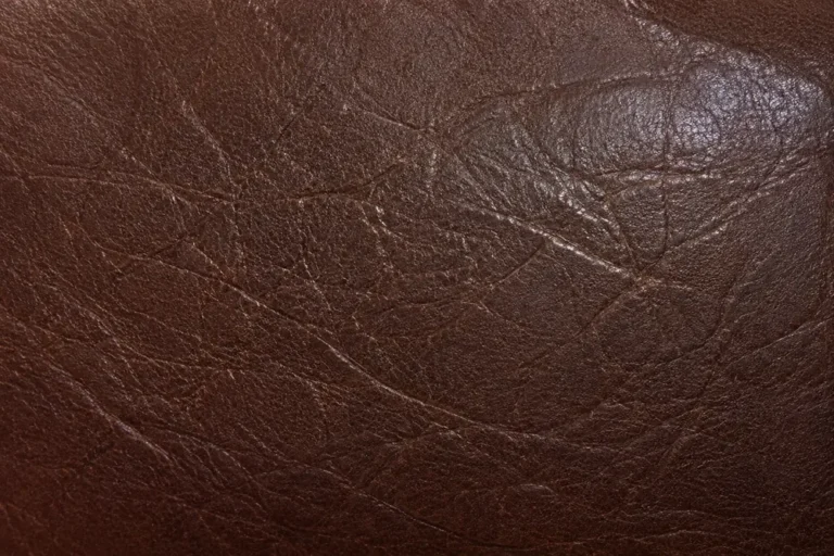 Brown leather grain up close, color-matched after a repair
