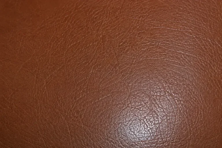 Close-up of leather grain matched on a repaired scratch
