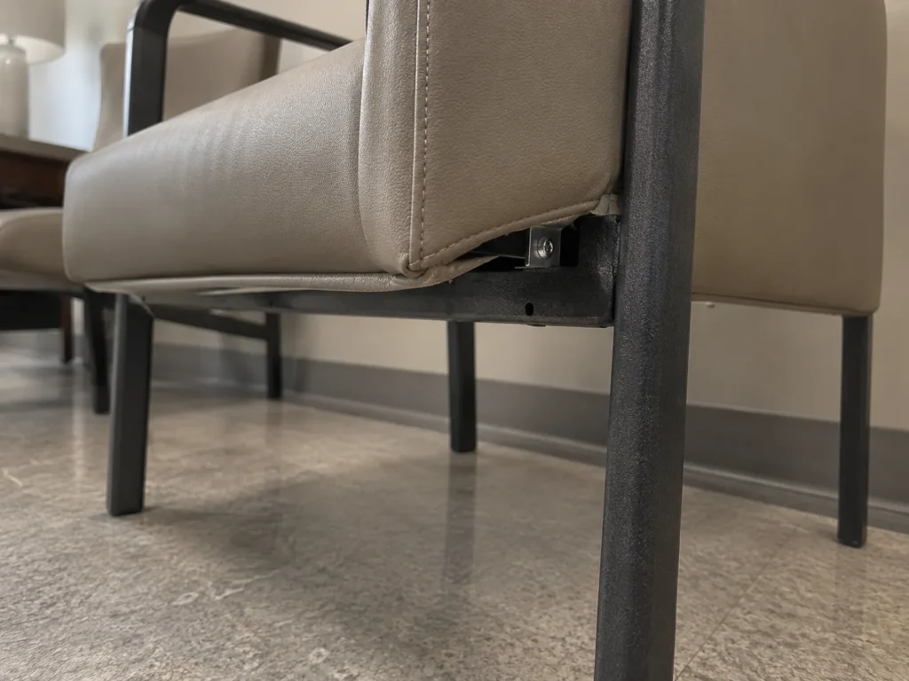 Loose seat board on a clinic lobby chair