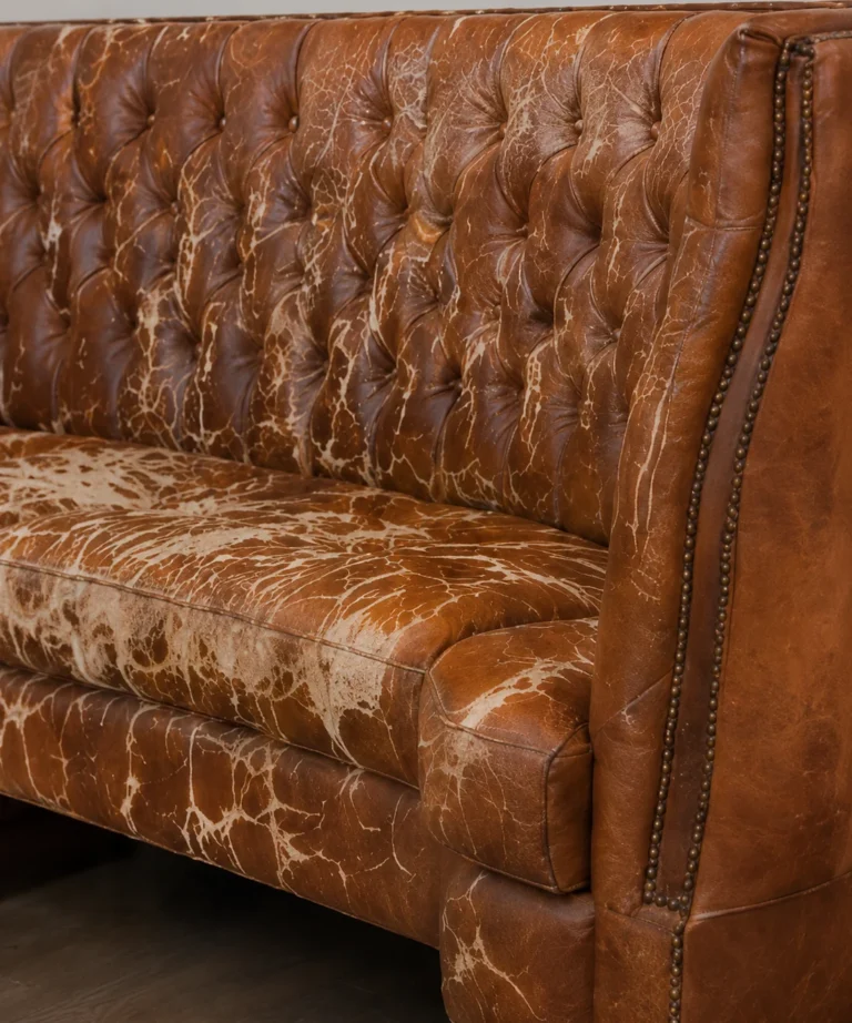 A worn chesterfield before new covers